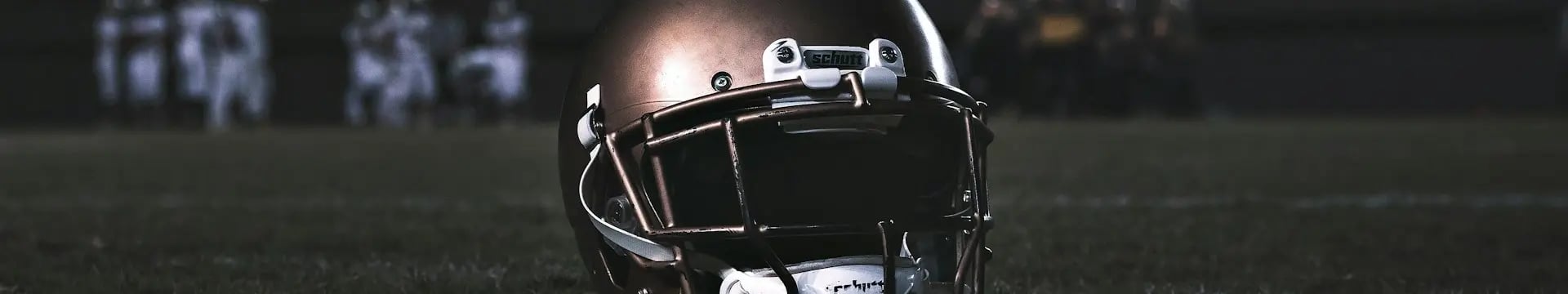 Football-Helmet-on-Grass_Banner Football-Helmet-on-Grass_Banner